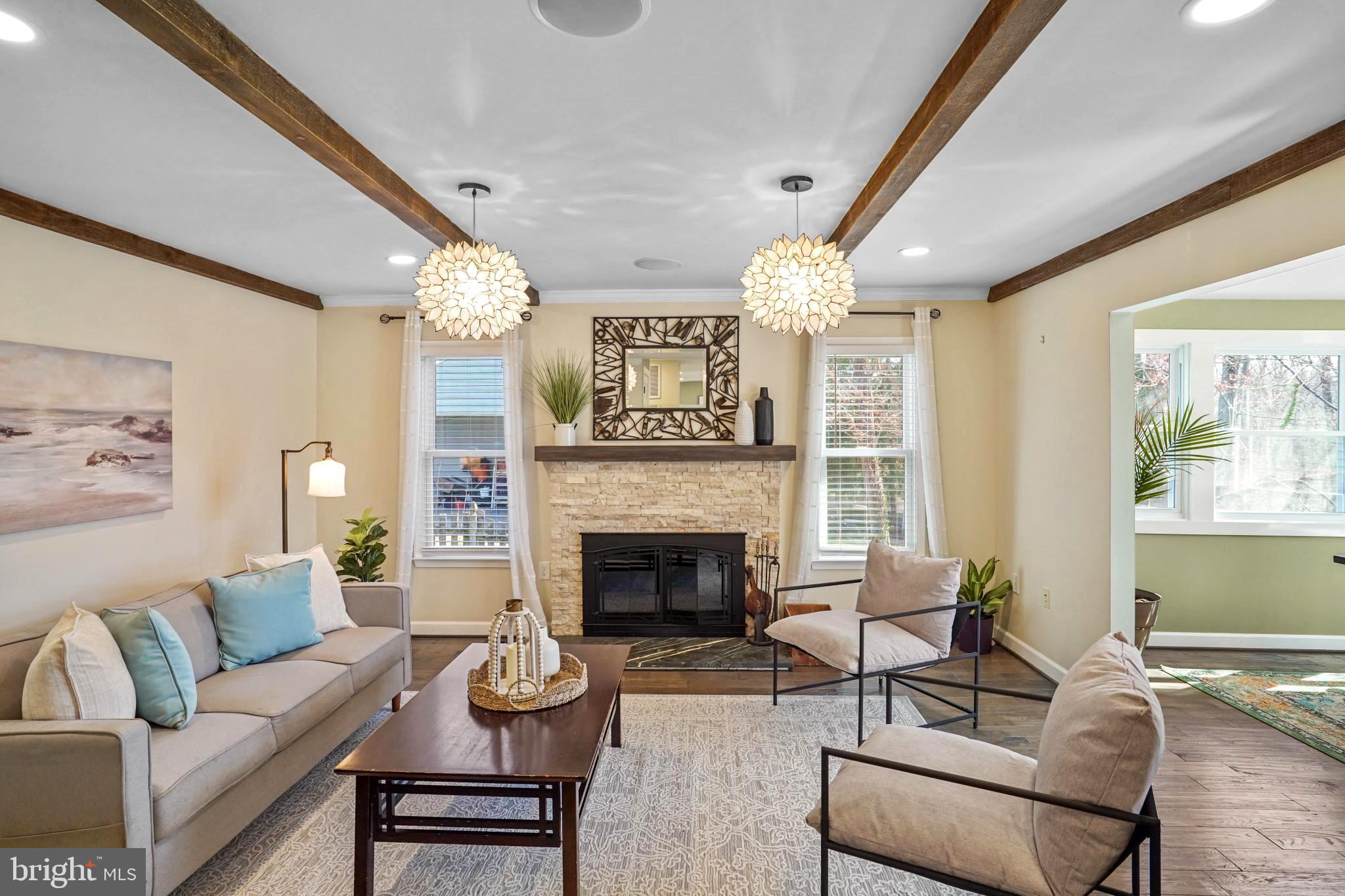9036 Brook Ford Road Burke, VA 22015 - Photo 11 of 40 a living room with furniture and a fireplace