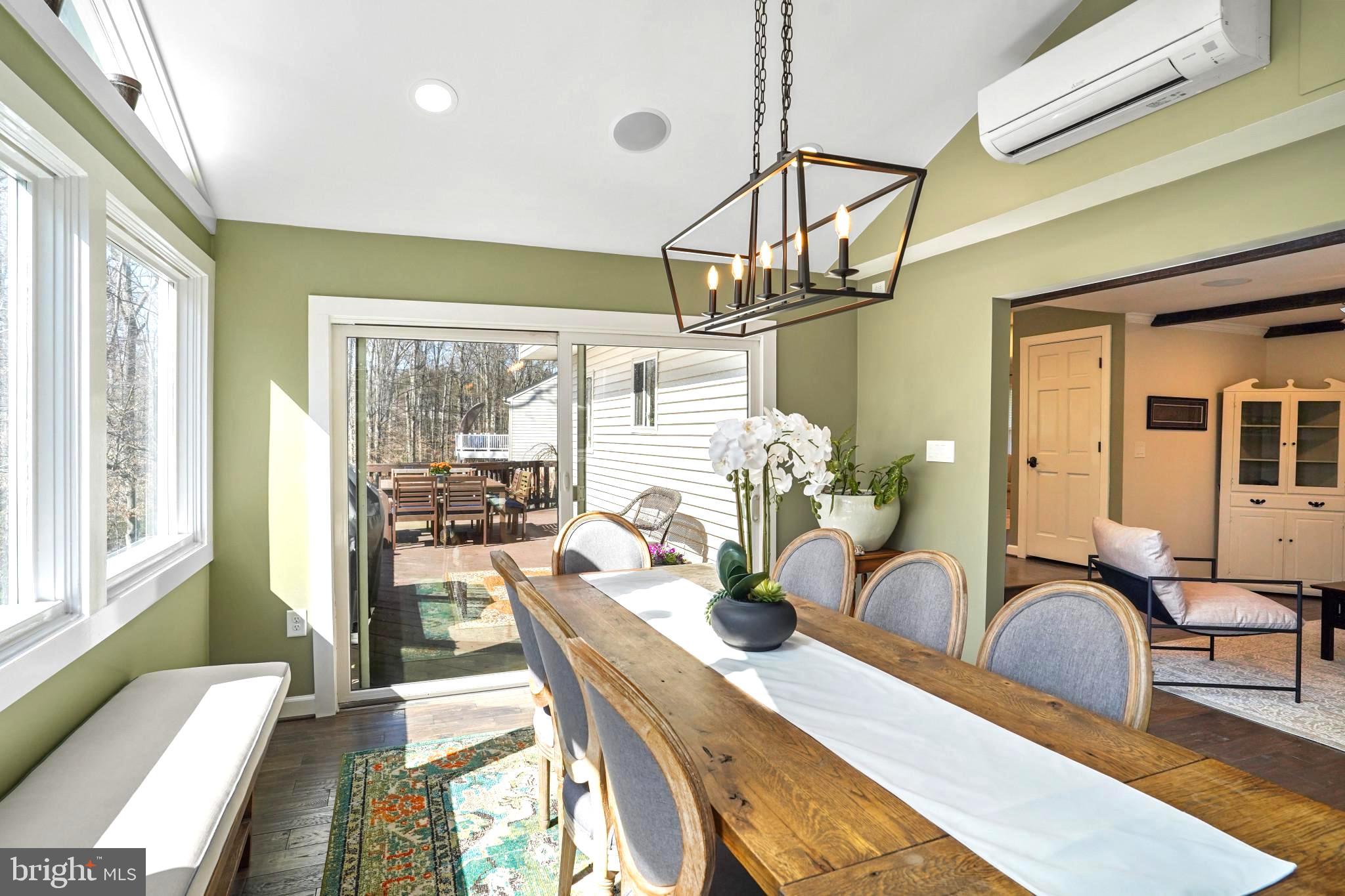 9036 Brook Ford Road Burke, VA 22015 - Photo 14 of 40 a view of a dining room with furniture window and outside view