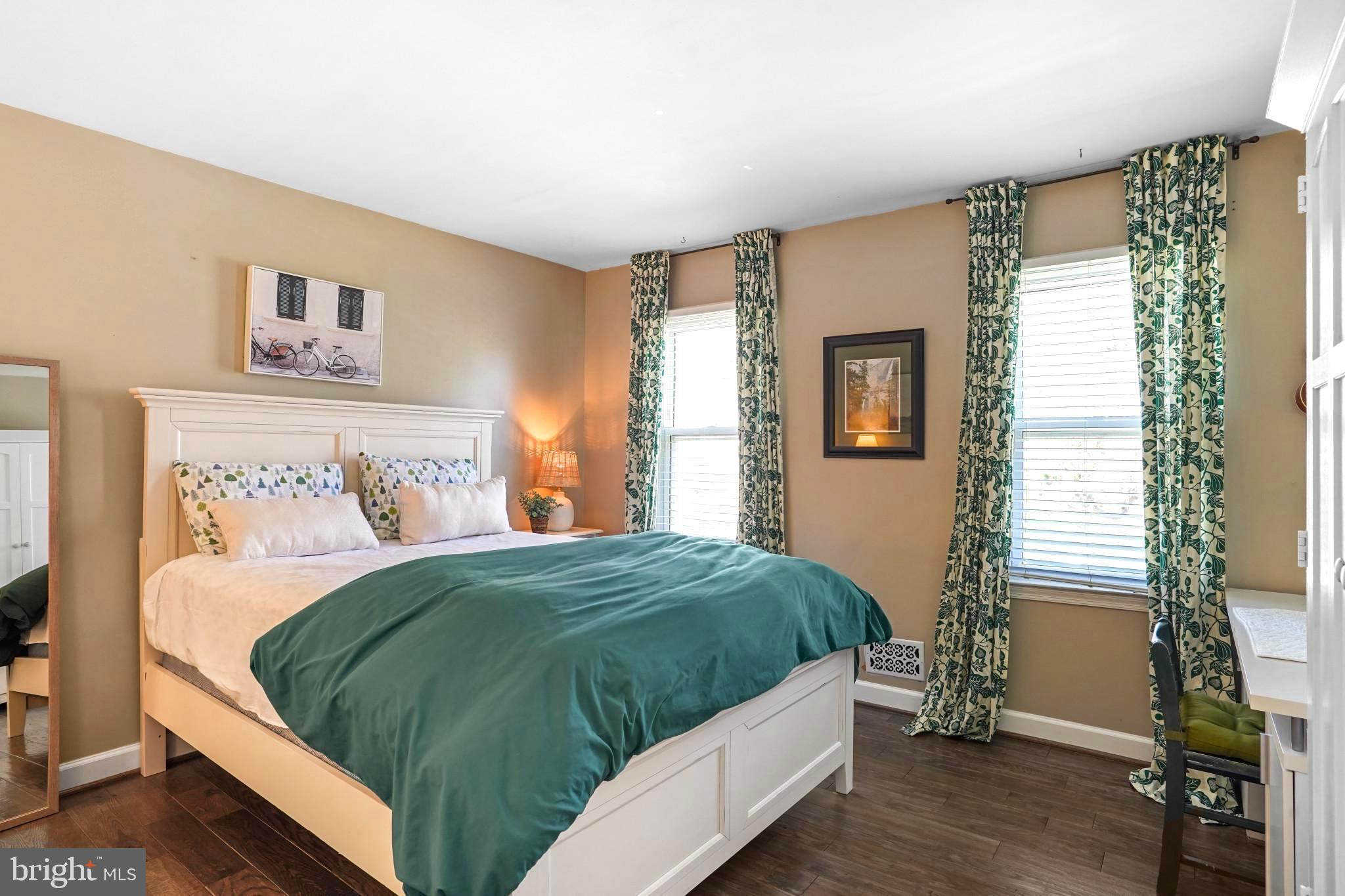 9036 Brook Ford Road Burke, VA 22015 - Photo 27 of 40 a bedroom with a bed and window