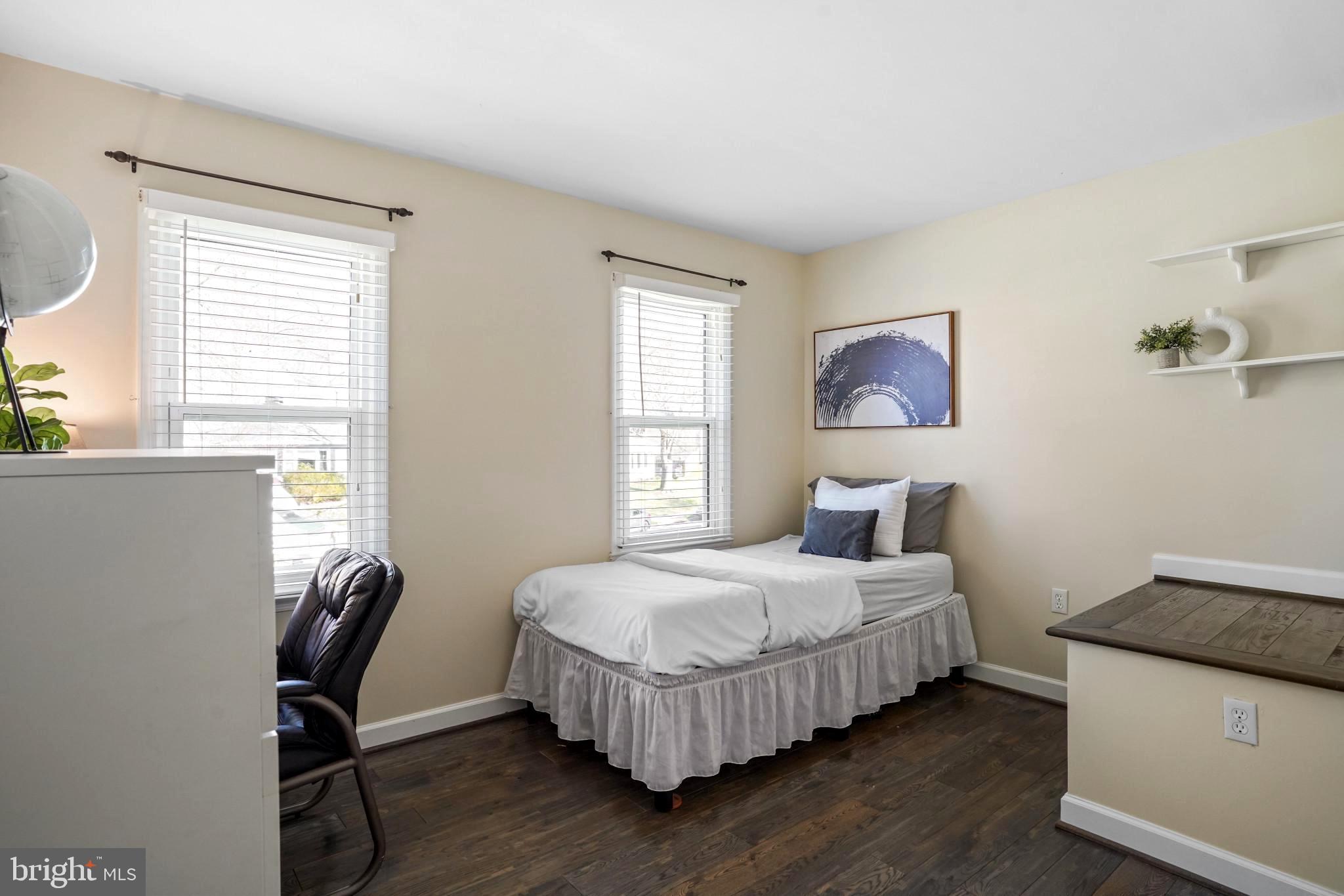 9036 Brook Ford Road Burke, VA 22015 - Photo 29 of 40 a bedroom with a bed and a window