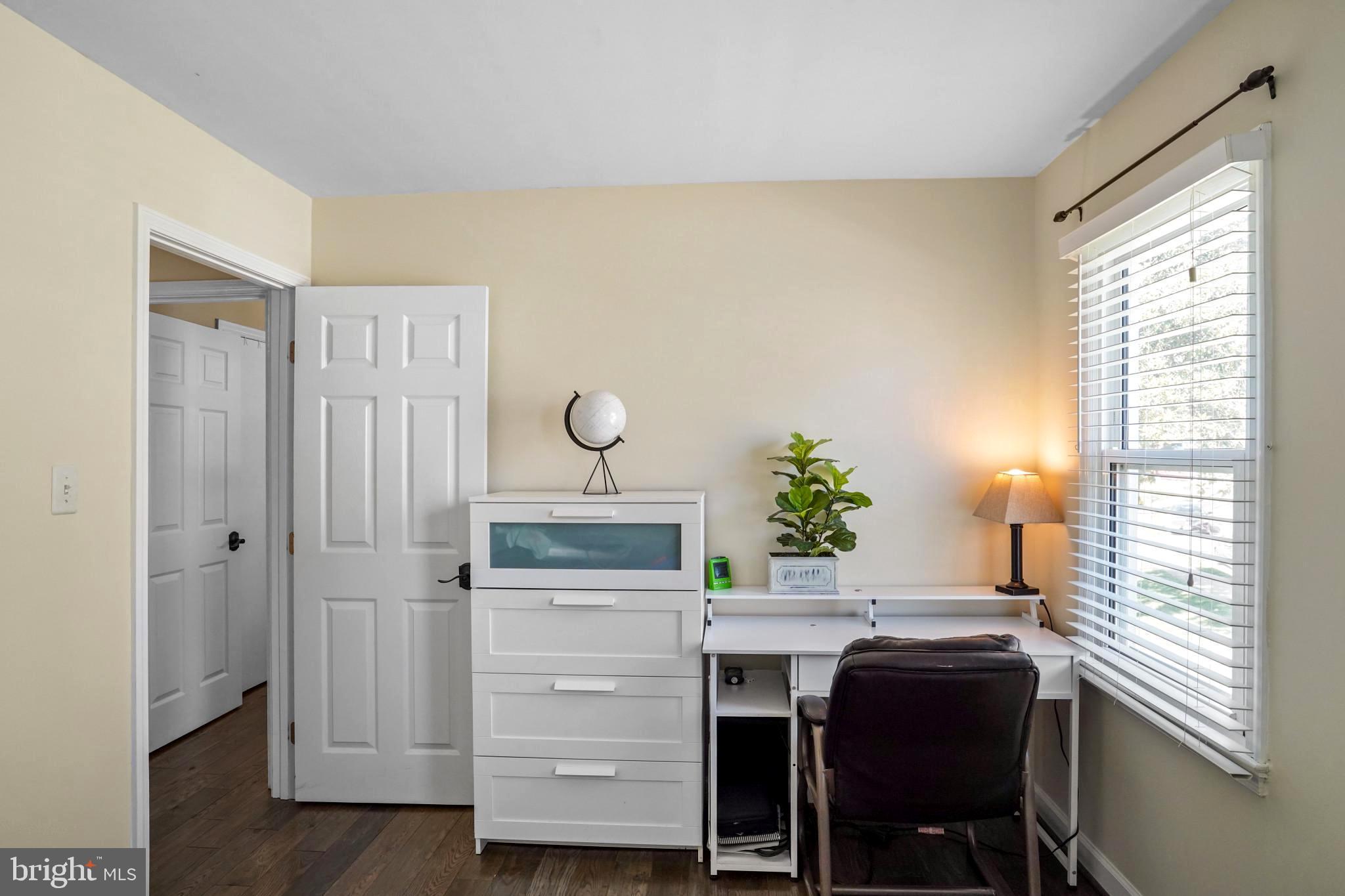 9036 Brook Ford Road Burke, VA 22015 - Photo 30 of 40 a room that has a window and a table in it