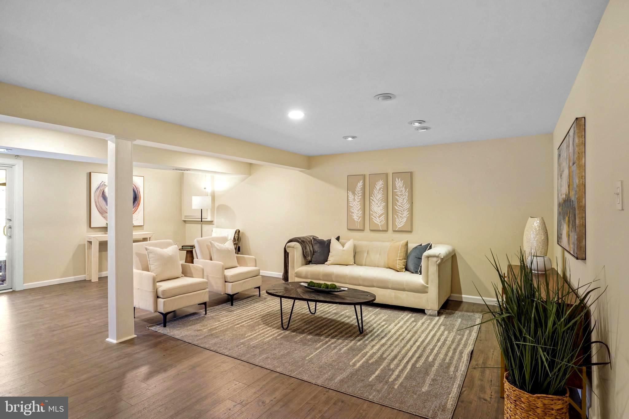 9036 Brook Ford Road Burke, VA 22015 - Photo 34 of 40 a living room with furniture and a large window