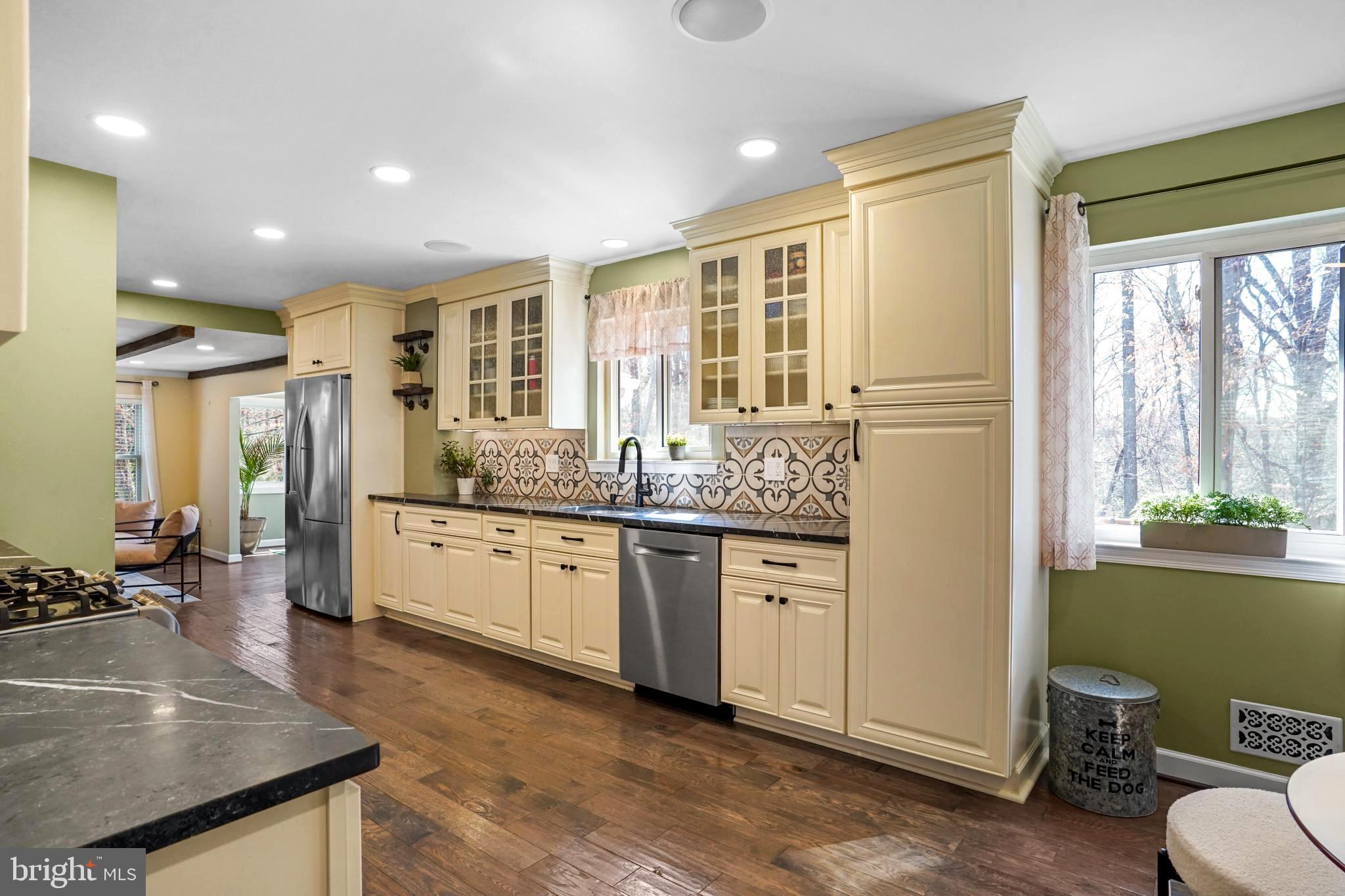 9036 Brook Ford Road Burke, VA 22015 - Photo 8 of 40 a large bathroom with a large window and stainless steel appliances
