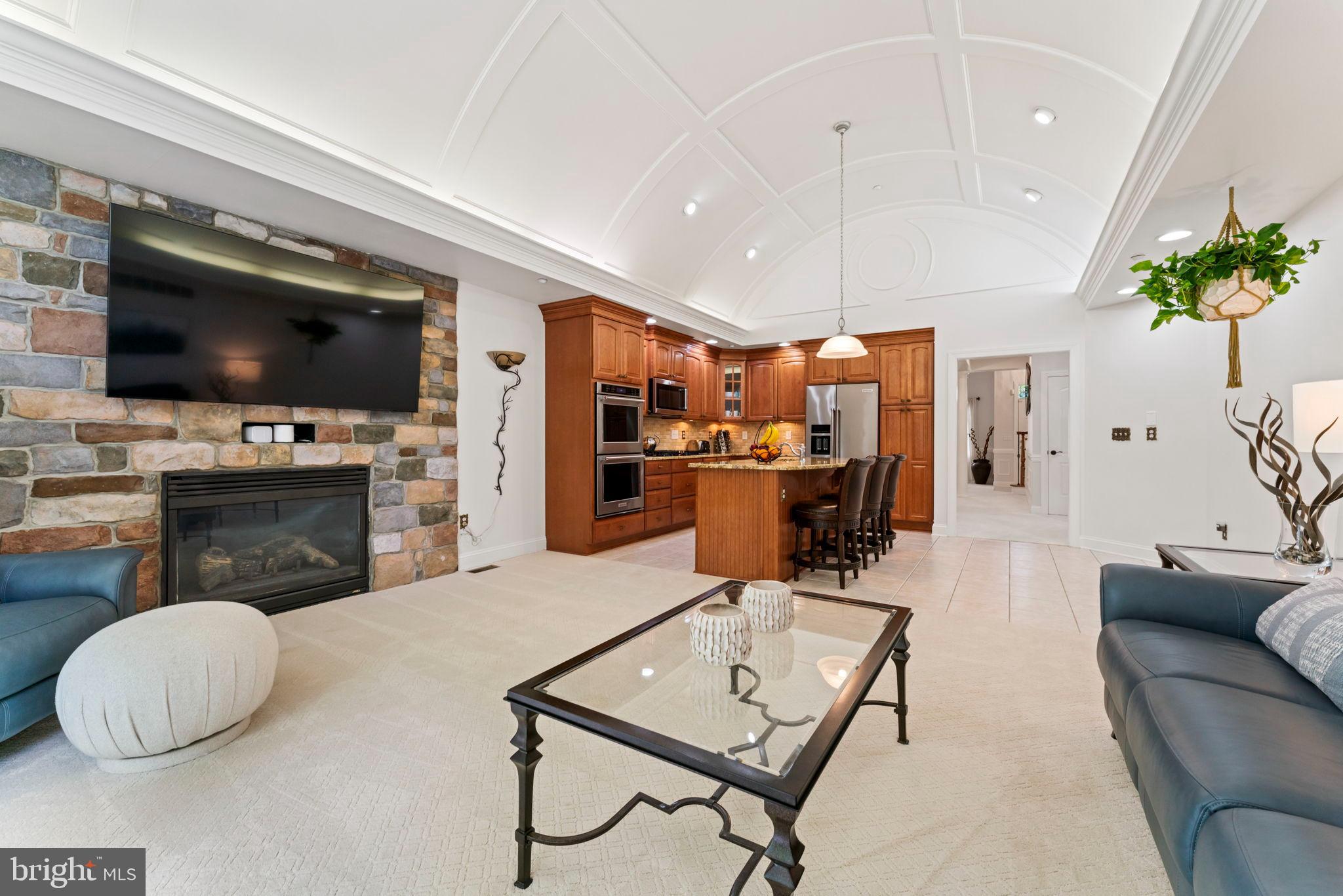 2411 Grand Oaks Court, Unit 30 Abingdon, MD 21009 - Photo 12 of 45 a living room with furniture and a flat screen tv