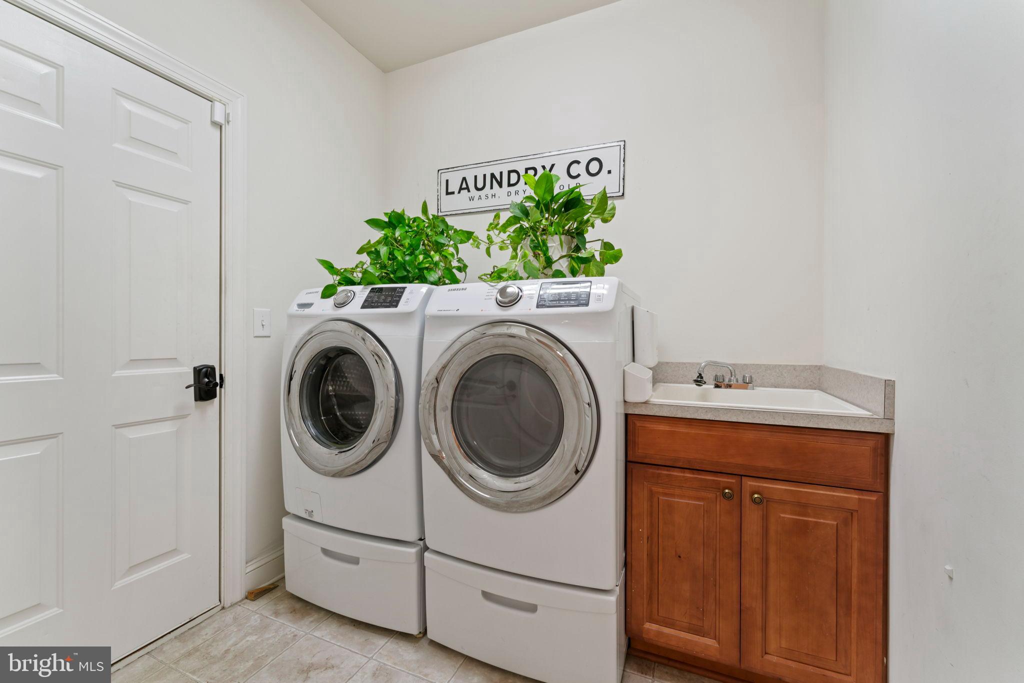 2411 Grand Oaks Court, Unit 30 Abingdon, MD 21009 - Photo 16 of 45 a utility room with dryer and washer