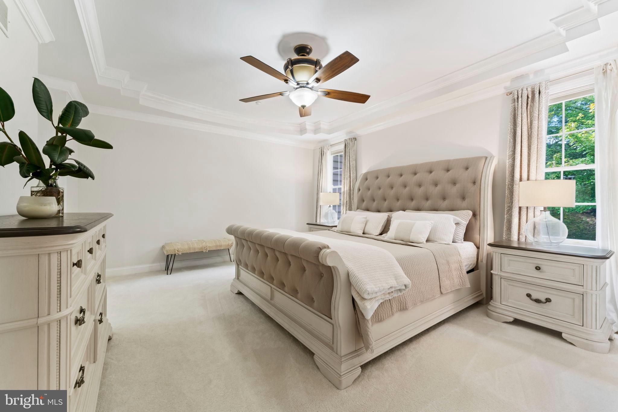 2411 Grand Oaks Court, Unit 30 Abingdon, MD 21009 - Photo 17 of 45 a bedroom with a bed and a chandelier