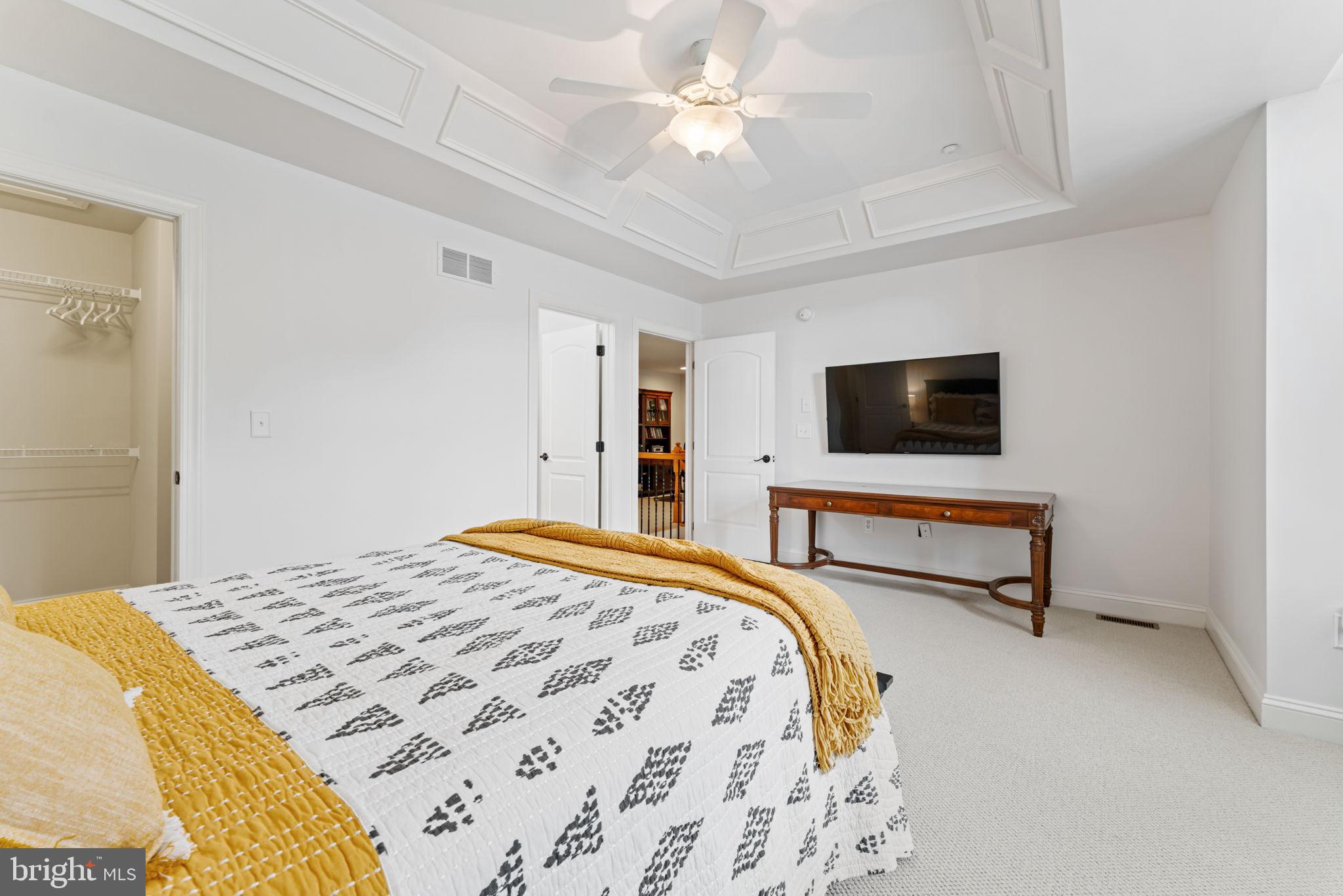 2411 Grand Oaks Court, Unit 30 Abingdon, MD 21009 - Photo 25 of 45 a bedroom with a bed and a flat screen tv