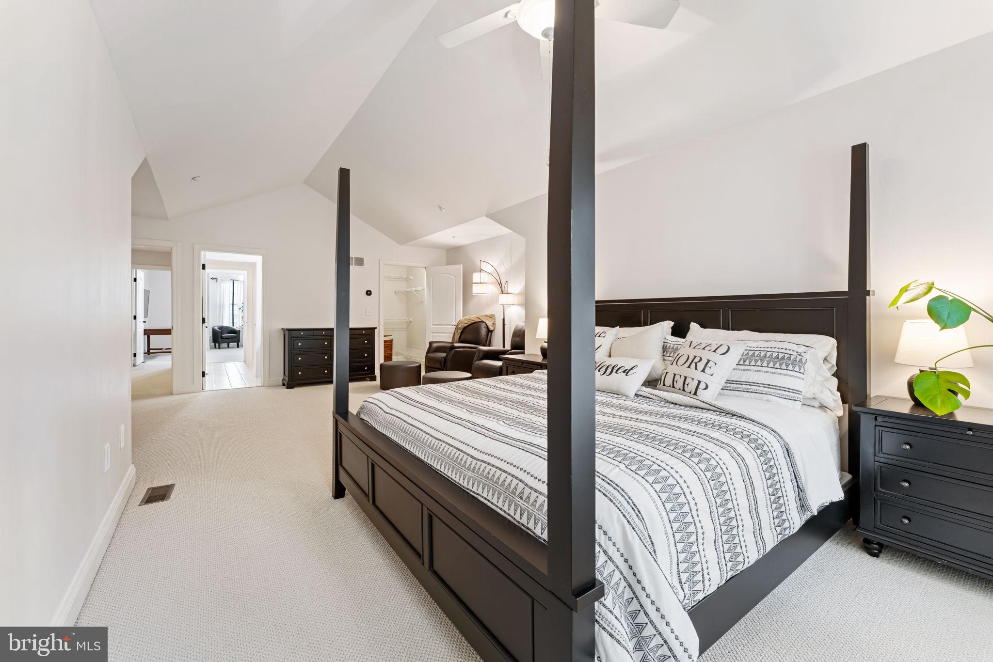 2411 Grand Oaks Court, Unit 30 Abingdon, MD 21009 - Photo 29 of 45 a bed room with a bed and a chandelier