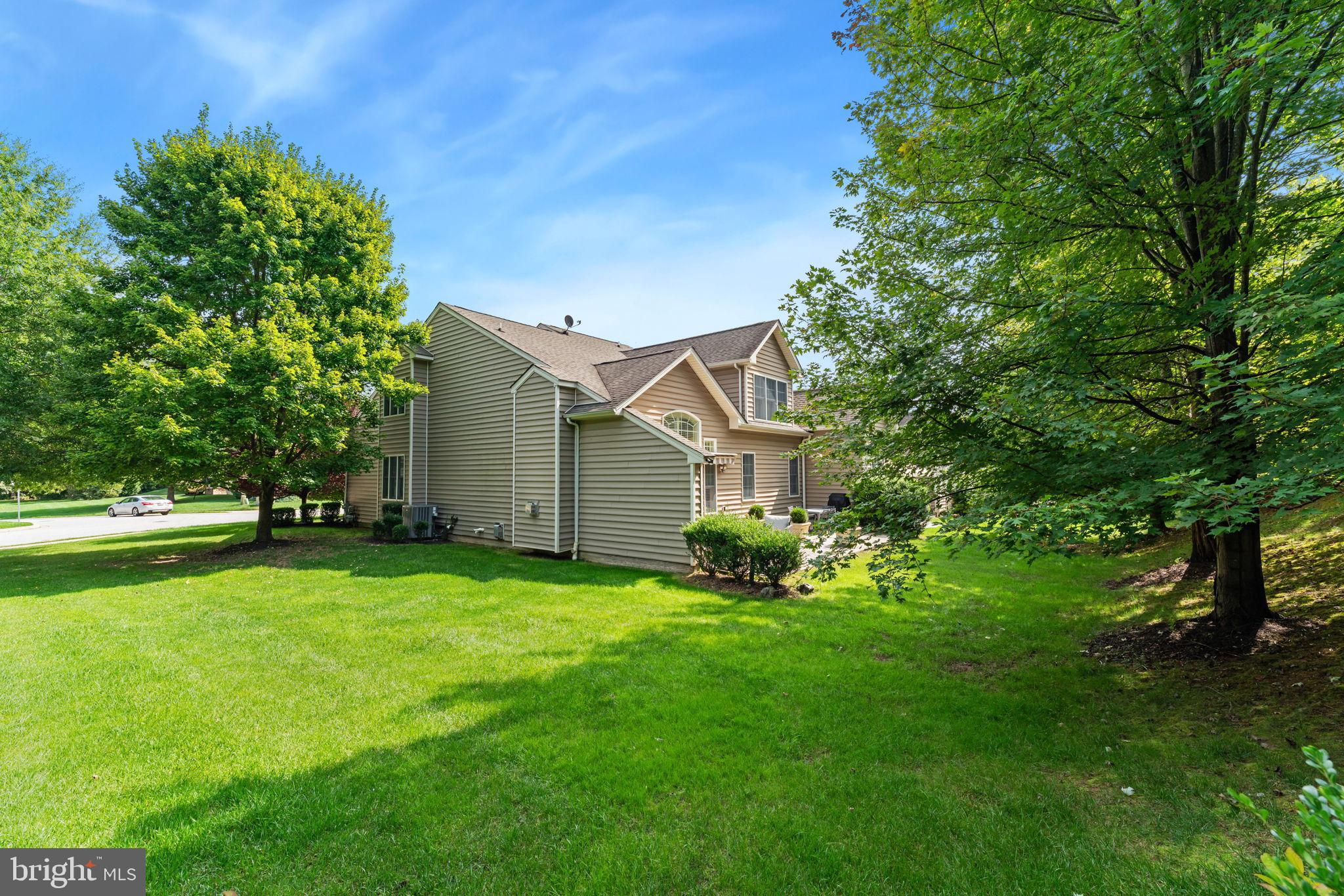 2411 Grand Oaks Court, Unit 30 Abingdon, MD 21009 - Photo 43 of 45 a backyard of a house with lots of green space