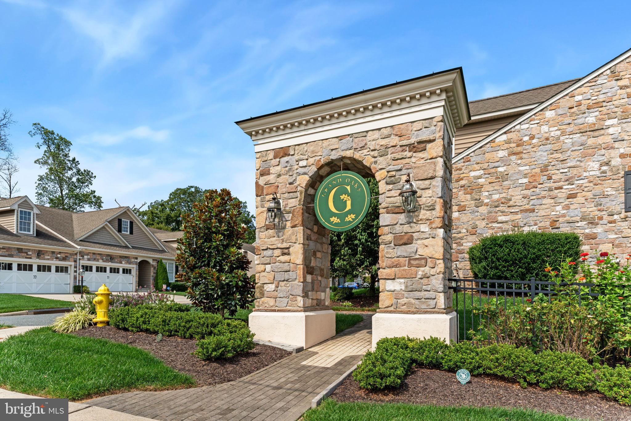 2411 Grand Oaks Court, Unit 30 Abingdon, MD 21009 - Photo 45 of 45 a front view of a house with garden