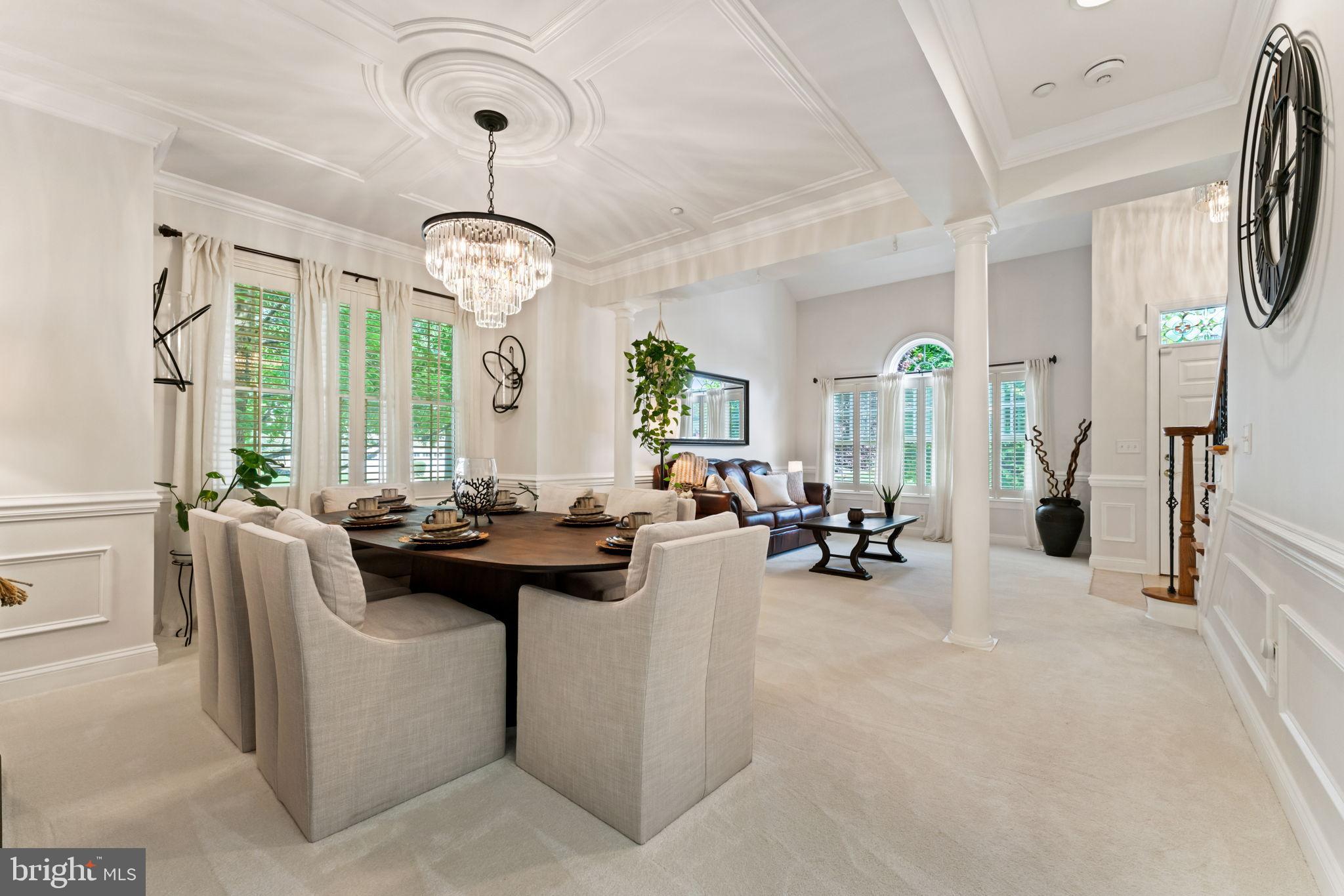 2411 Grand Oaks Court, Unit 30 Abingdon, MD 21009 - Photo 7 of 45 a living room with fireplace furniture and a chandelier