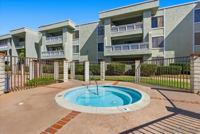 an aerial view of a house with outdoor space