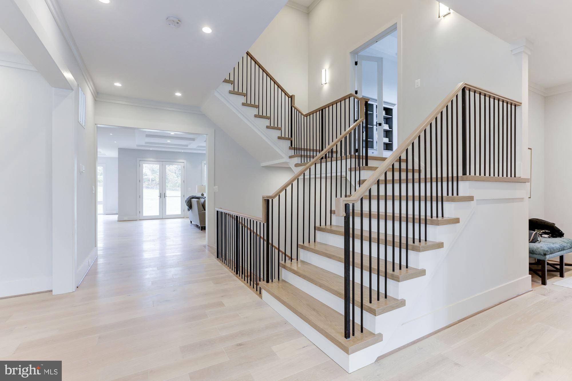 1823 Beulah Road Vienna, VA 22182 - Photo 15 of 70 Spectacular staircase opens to two half floors