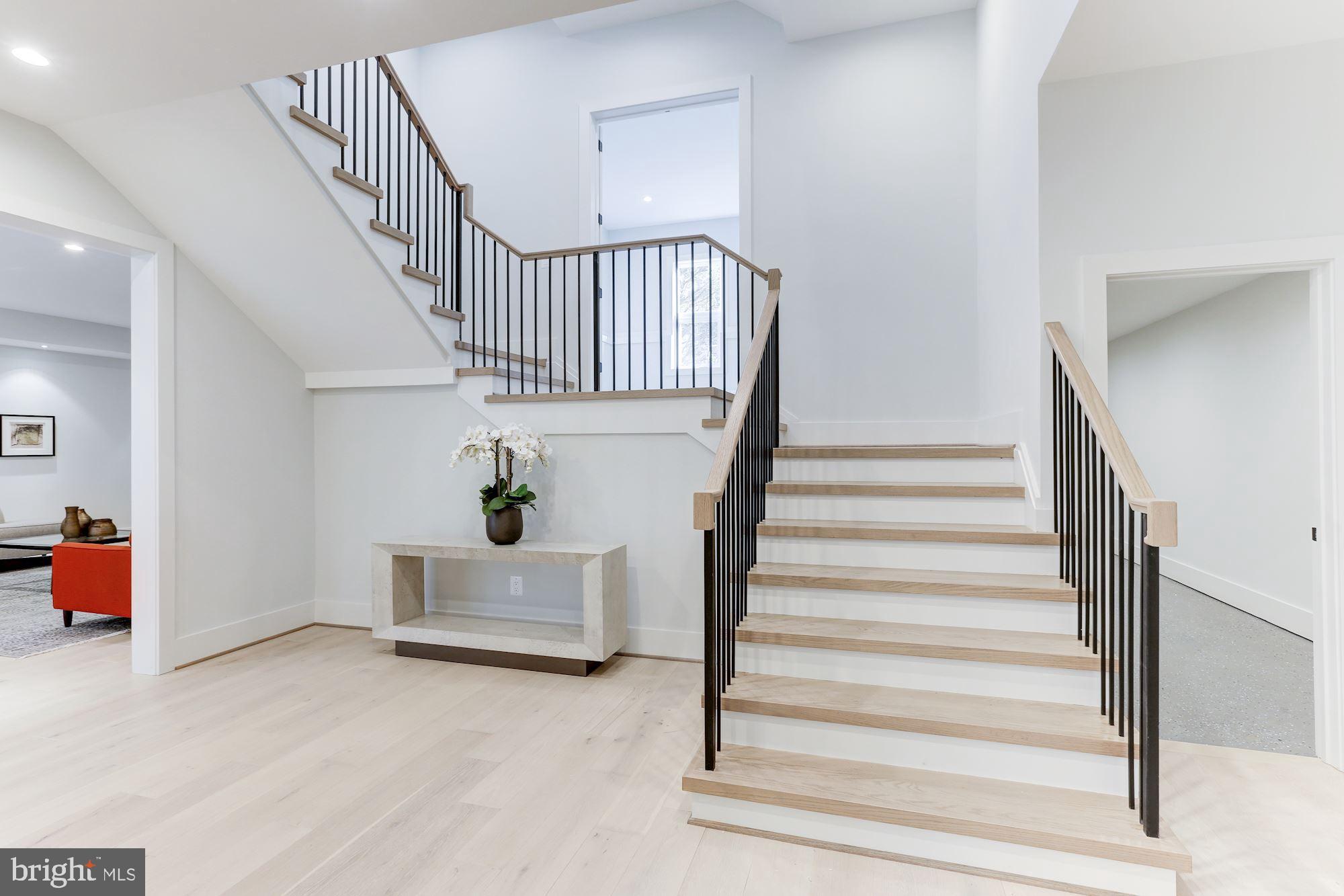 1823 Beulah Road Vienna, VA 22182 - Photo 51 of 70 Grand staircase leading to sunny &chic lower level