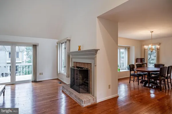 a view of a livingroom with furniture and wooden floor
