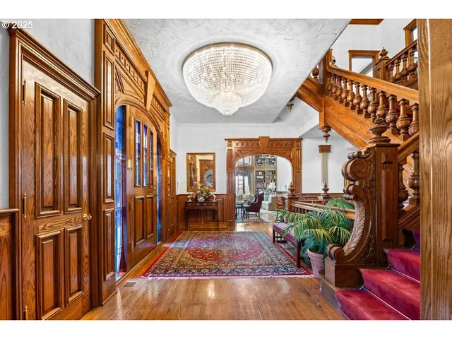 a open kitchen with stainless steel appliances kitchen island granite countertop a sink and cabinets