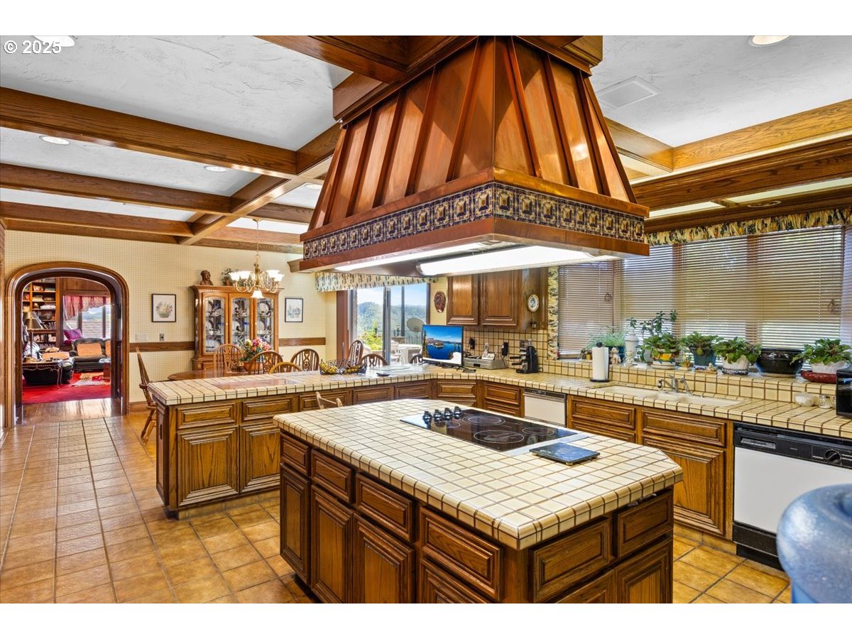 331 Metz Hill Road Oakland, OR 97462 - Photo 28 of 47 a kitchen with a sink and cabinets