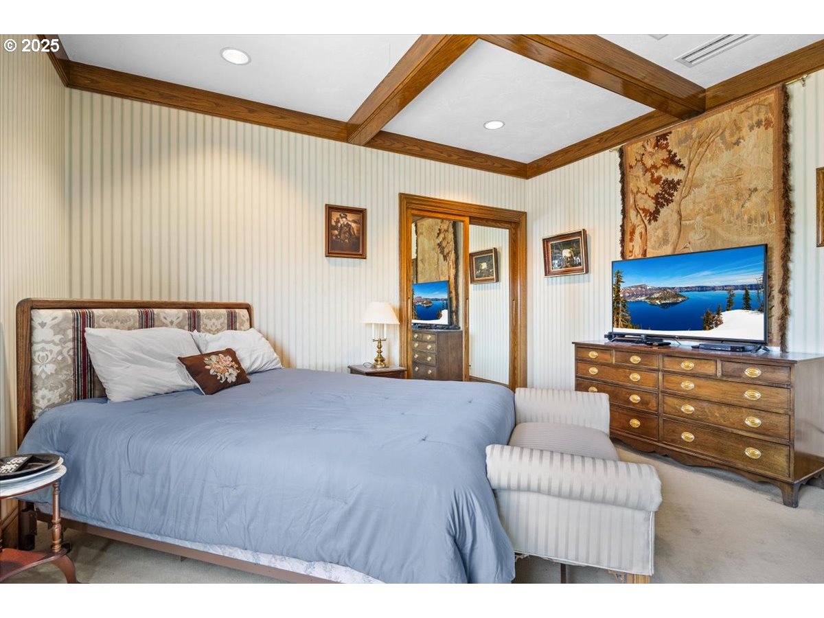 331 Metz Hill Road Oakland, OR 97462 - Photo 37 of 47 a bedroom with a bed and a couch