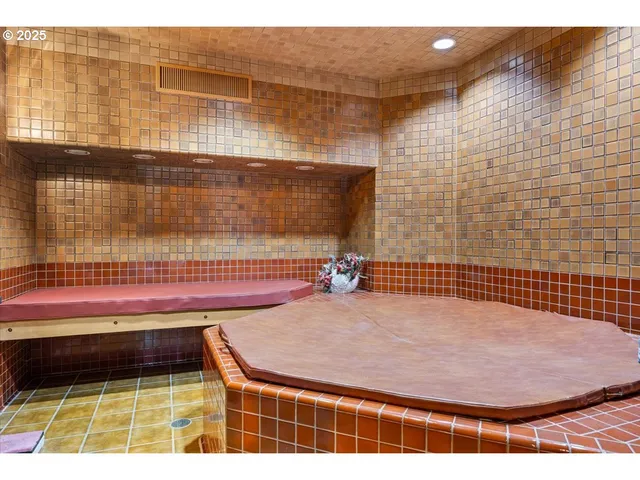 a view of an chairs and table in a patio