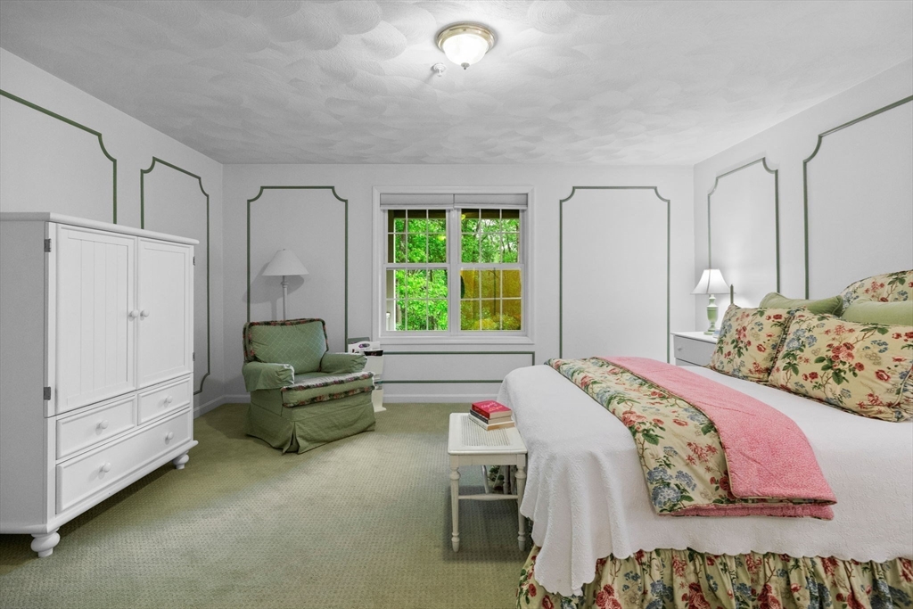 18 Dale Street, Unit 7A Andover, MA 01810 - Photo 18 of 34 a bedroom with a bed couch and window