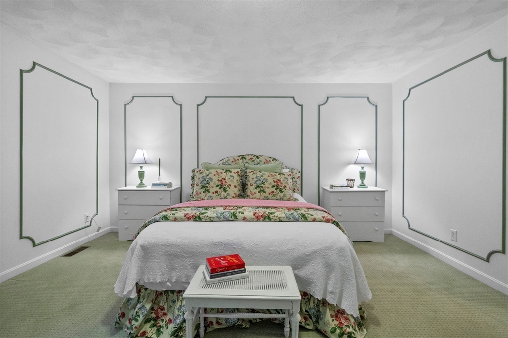 18 Dale Street, Unit 7A Andover, MA 01810 - Photo 19 of 34 a bed room with a bed and a table