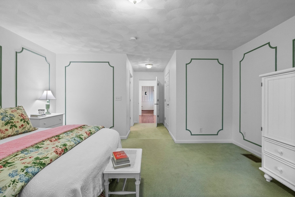 18 Dale Street, Unit 7A Andover, MA 01810 - Photo 20 of 34 a living room with furniture and a table