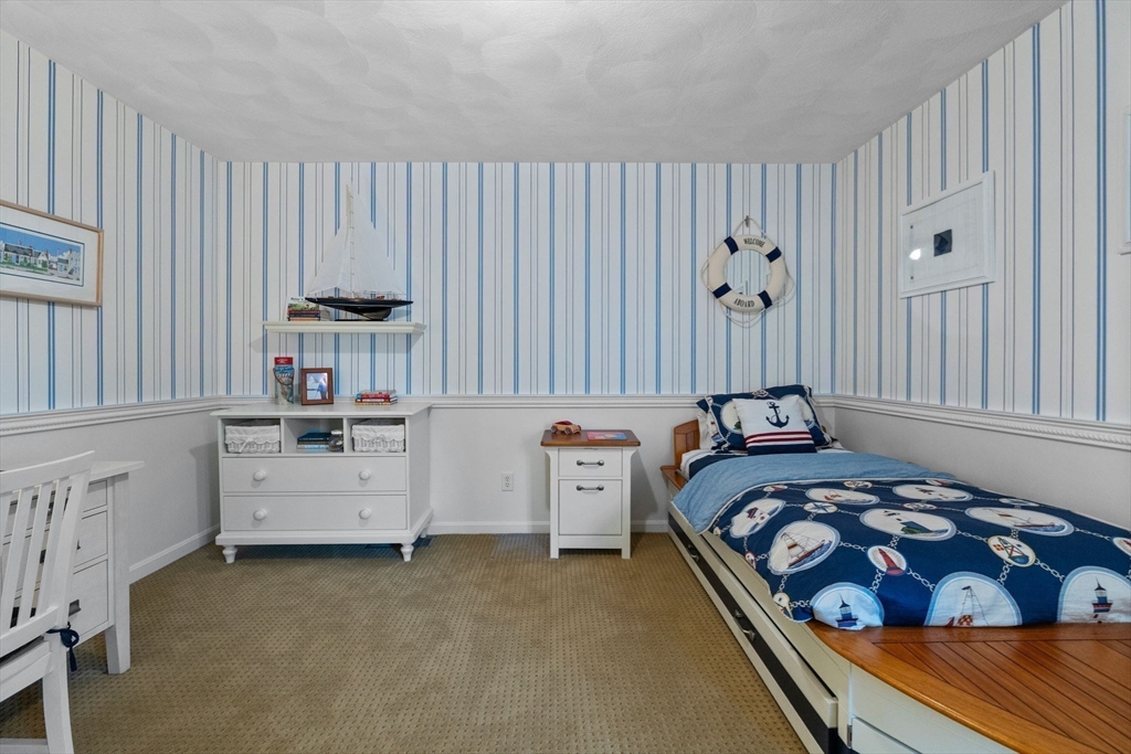 18 Dale Street, Unit 7A Andover, MA 01810 - Photo 23 of 34 a bedroom with furniture and a window