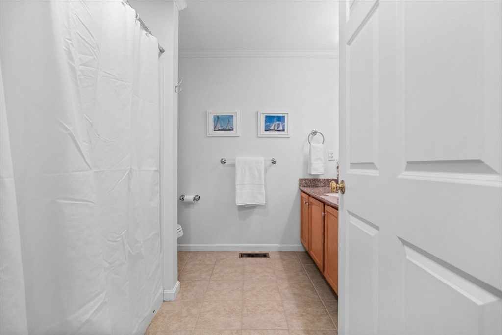18 Dale Street, Unit 7A Andover, MA 01810 - Photo 25 of 34 a kitchen with a refrigerator and stove