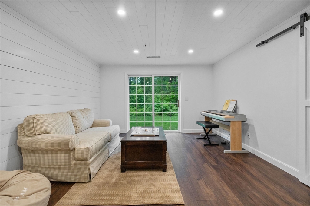 18 Dale Street, Unit 7A Andover, MA 01810 - Photo 29 of 34 a living room with furniture and a window
