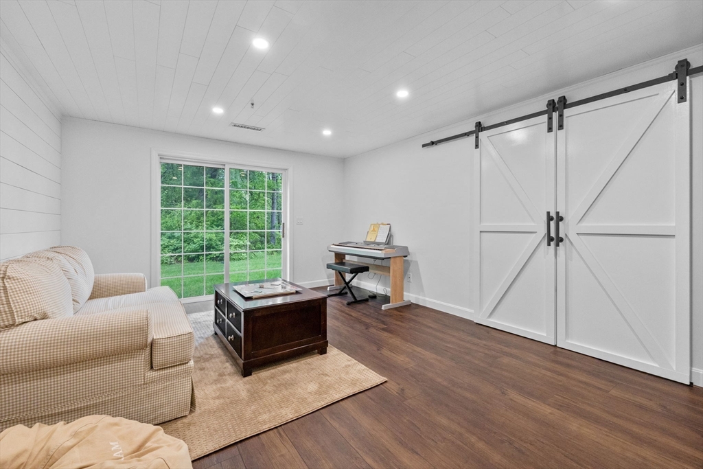 18 Dale Street, Unit 7A Andover, MA 01810 - Photo 30 of 34 a living room with furniture and a window