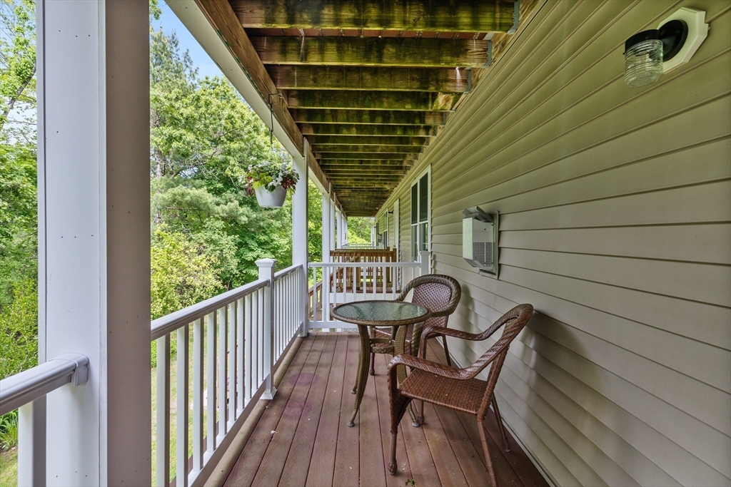 18 Dale Street, Unit 7A Andover, MA 01810 - Photo 32 of 34 a view of a two chairs in the balcony