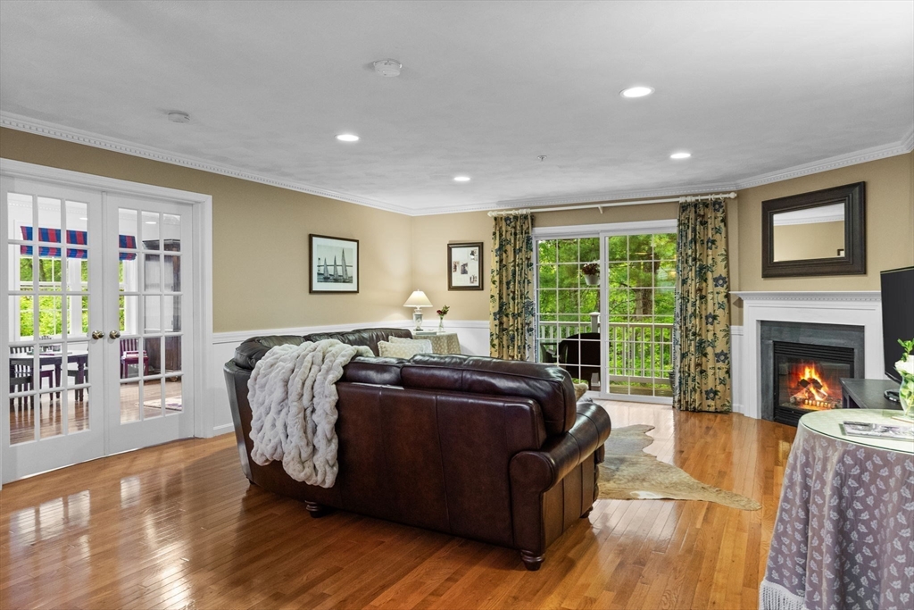 18 Dale Street, Unit 7A Andover, MA 01810 - Photo 5 of 34 a living room with furniture and a fireplace