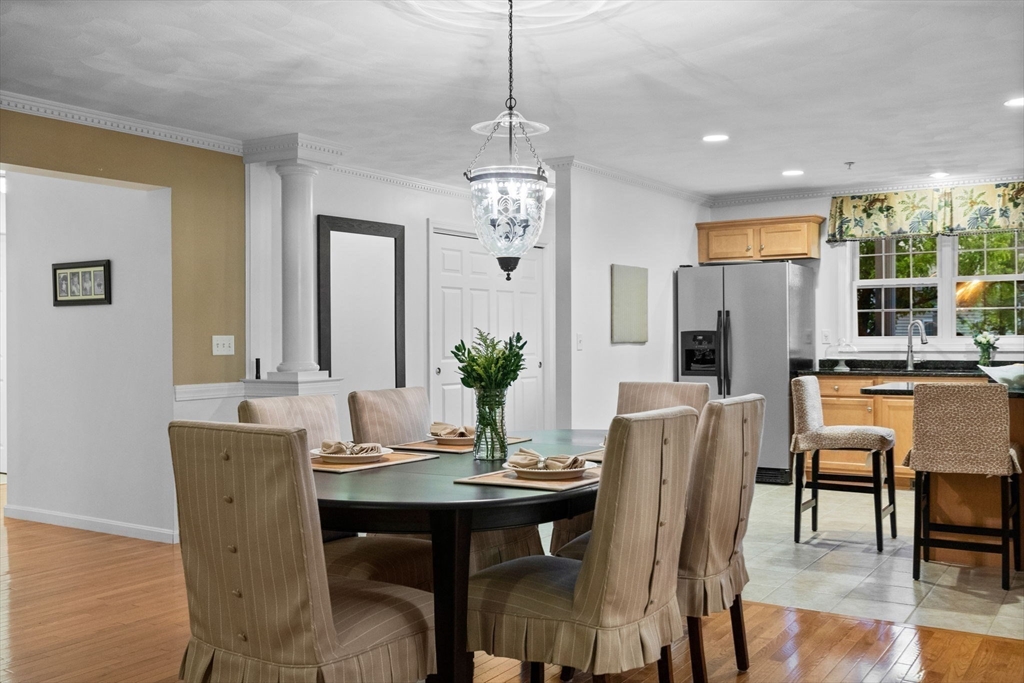 18 Dale Street, Unit 7A Andover, MA 01810 - Photo 9 of 34 a view of a dining room with furniture window and wooden floor
