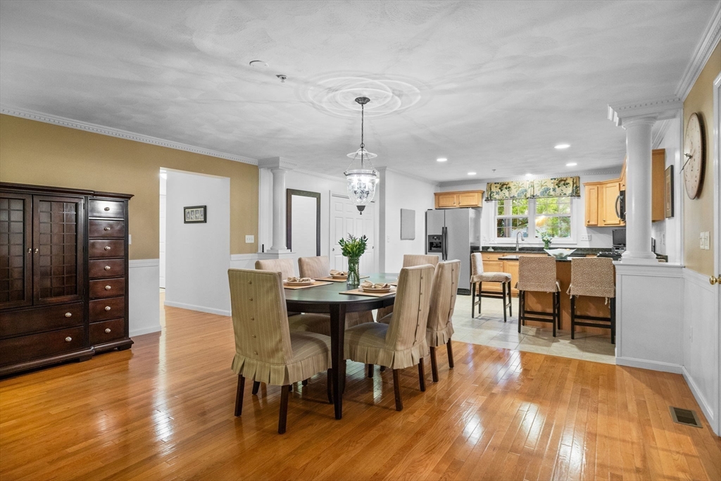 18 Dale Street, Unit 7A Andover, MA 01810 - Photo 10 of 34 a view of a dining room with furniture window and wooden floor