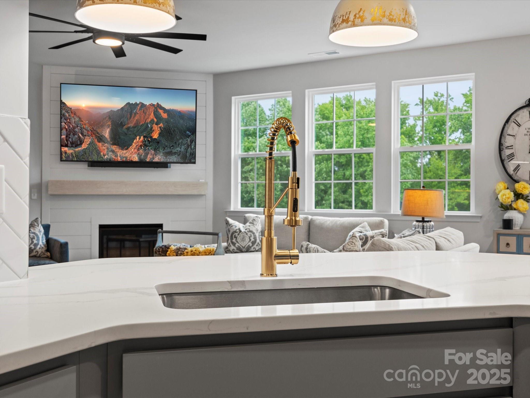 5581 Soft Shell Drive Lancaster, SC 29720 - Photo 11 of 48 a view of a kitchen with a large window and a sink