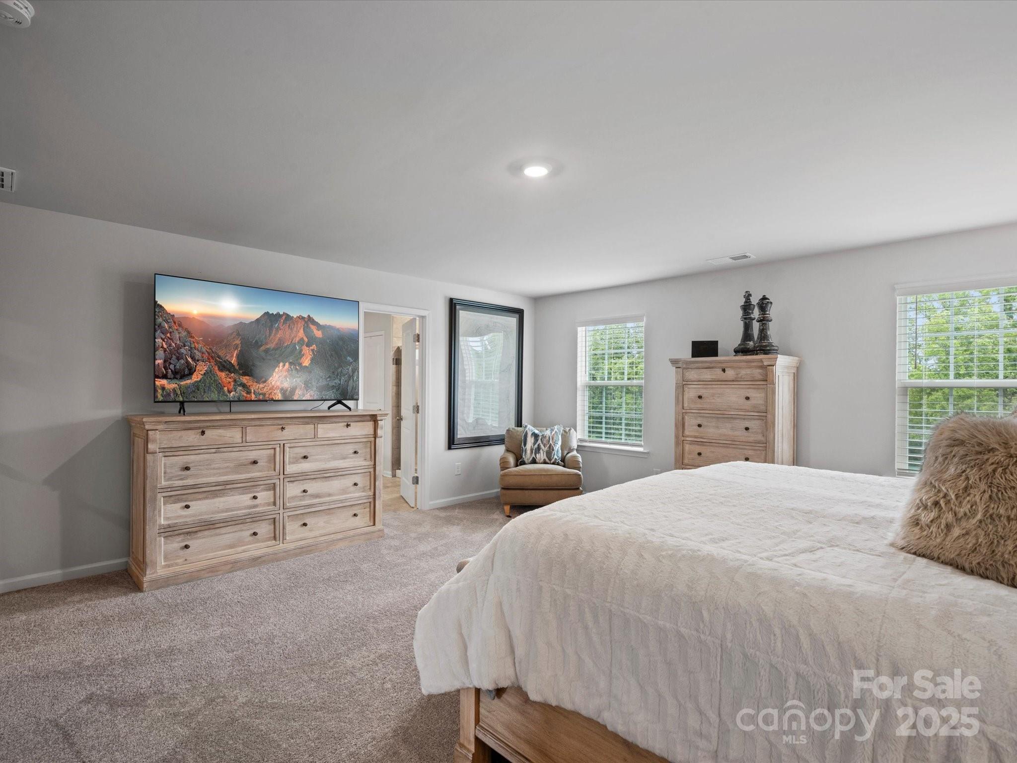 5581 Soft Shell Drive Lancaster, SC 29720 - Photo 27 of 48 a bedroom with a bed and dresser
