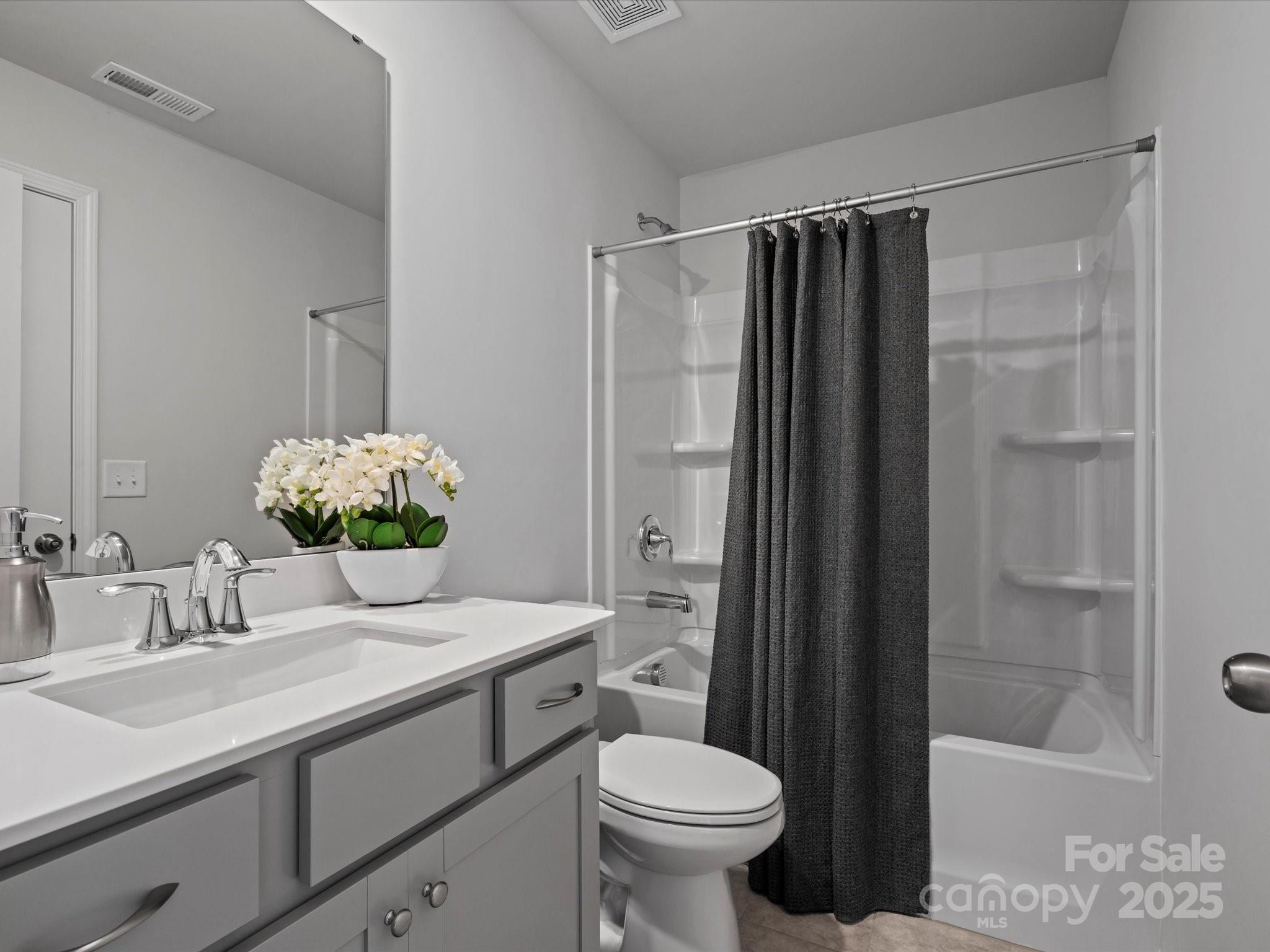 5581 Soft Shell Drive Lancaster, SC 29720 - Photo 38 of 48 a bathroom with a sink toilet and shower