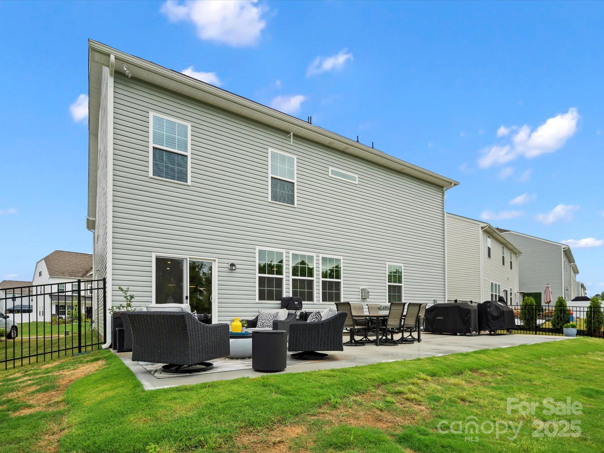 5581 Soft Shell Drive Lancaster, SC 29720 - Photo 48 of 48 a backyard of a house with seating space