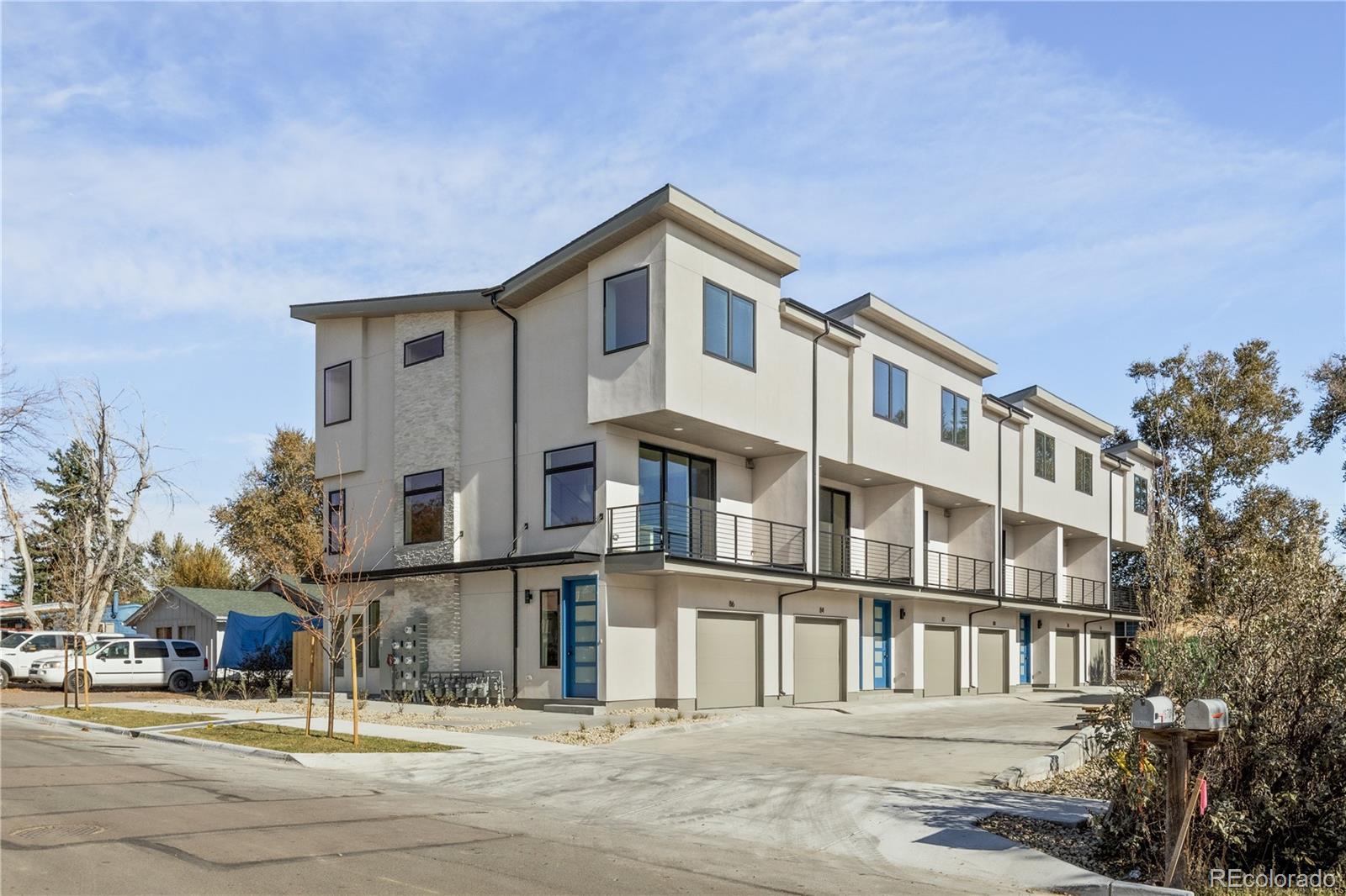 1686 Tabor Street Lakewood, CO 80215 - Photo 2 of 34 a view of a building with a street