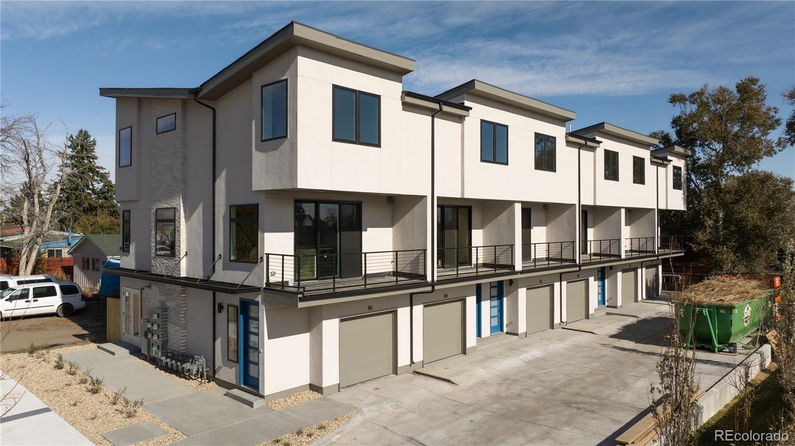 1686 Tabor Street Lakewood, CO 80215 - Photo 25 of 34 a front view of a house with balcony