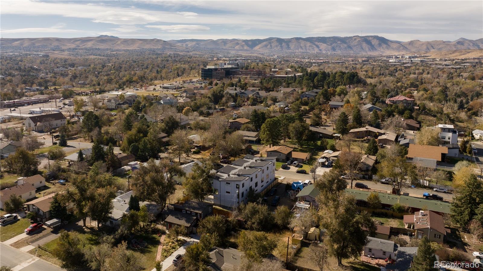 1686 Tabor Street Lakewood, CO 80215 - Photo 31 of 34 an aerial view of house with yard and mountain view