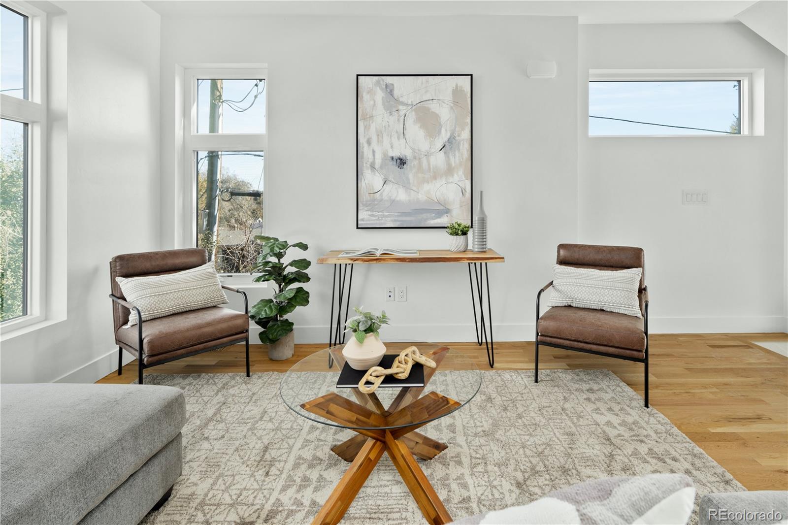 1686 Tabor Street Lakewood, CO 80215 - Photo 6 of 34 a living room with furniture and a rug