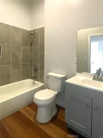 a bathroom with a sink toilet and bathtub