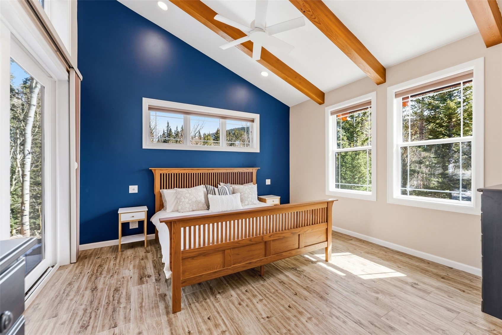1227 Edgewood Road Alma, CO 80420 - Photo 12 of 40 a bedroom with a bed and wooden floor
