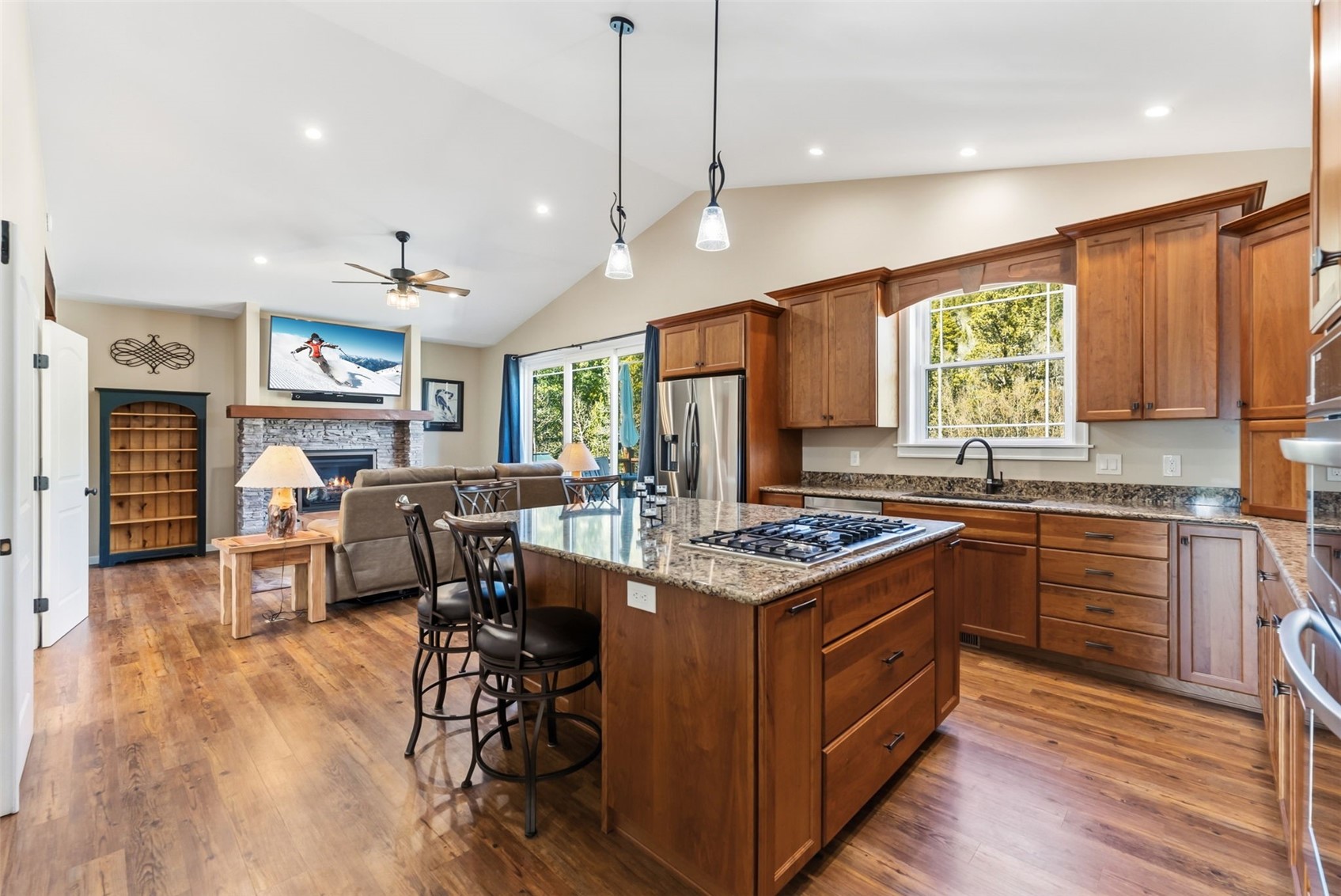 1227 Edgewood Road Alma, CO 80420 - Photo 21 of 40 a kitchen with stainless steel appliances granite countertop center island wooden floor and a sink
