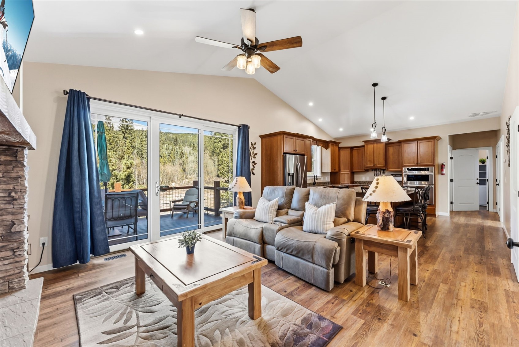 1227 Edgewood Road Alma, CO 80420 - Photo 23 of 40 a living room with furniture ceiling fan and a large window