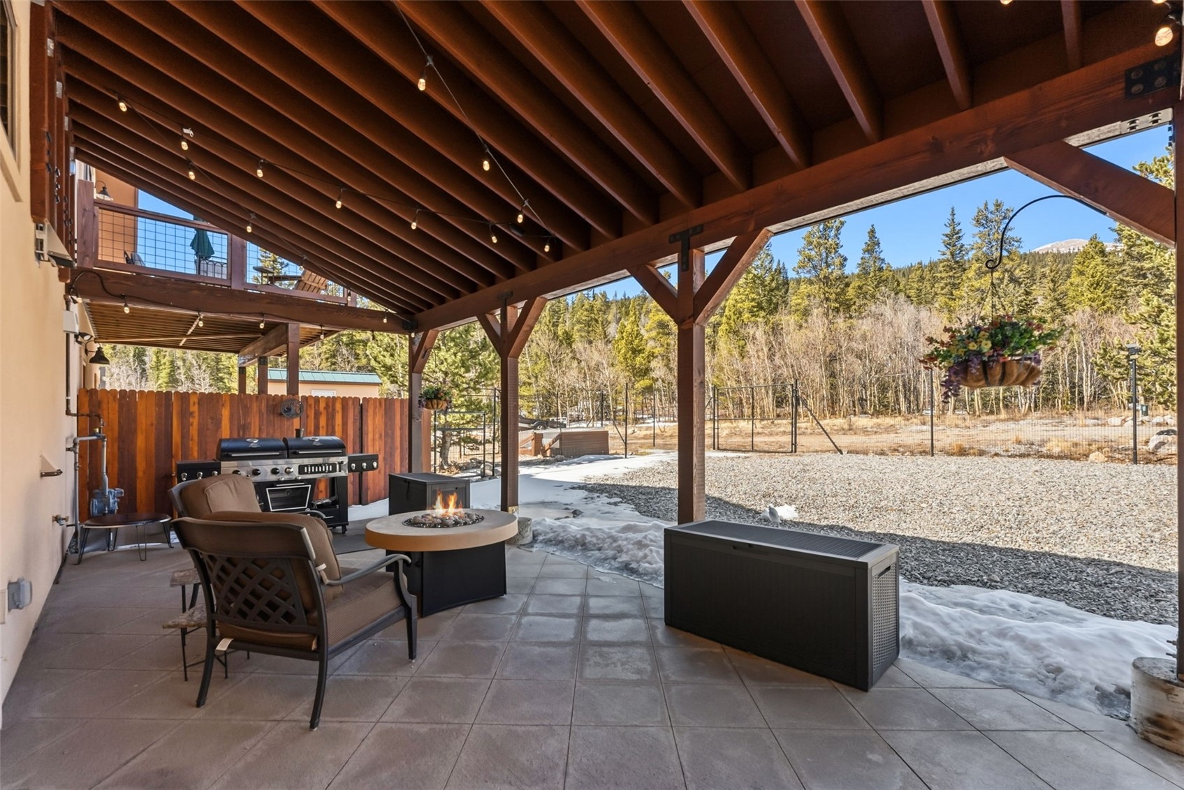 1227 Edgewood Road Alma, CO 80420 - Photo 31 of 39 Main House Patio with Firepit and Fenced in Yard