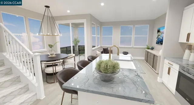 a living room with furniture a fireplace and a chandelier