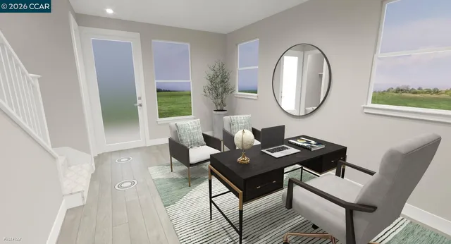 a work room with furniture and a window