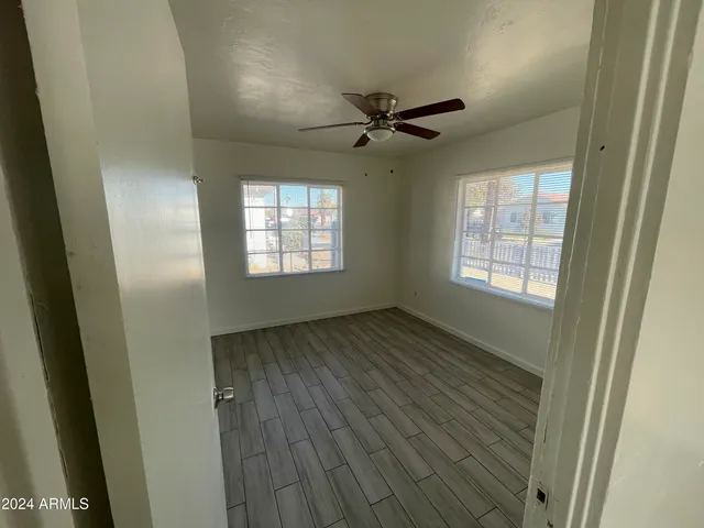 a view of an empty room and window